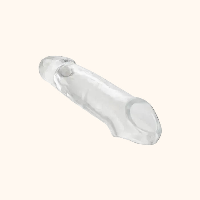 A clear A Little More Extender Bedroom Toy by Euforia against a white background.