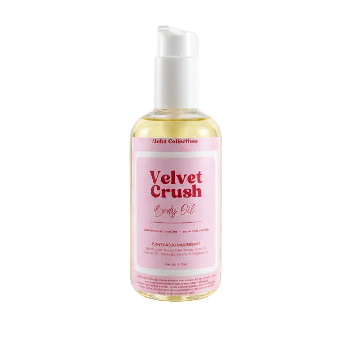 A bottle of Velvet Crush Body oil from Aloha Collection against a white background.