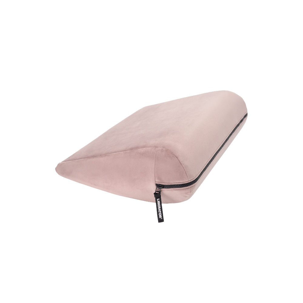 Rose double curved Jaz pillow with a black zipper on a white background