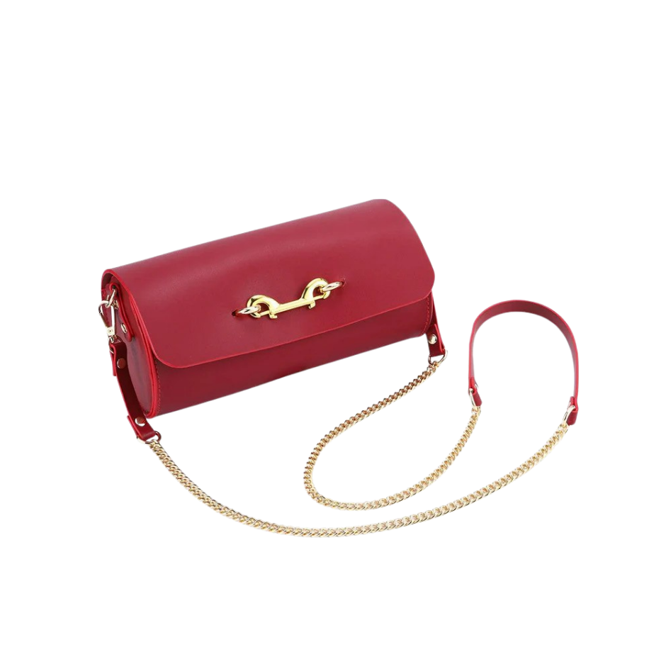 A closed red Luxe Bondage Kink purse.
