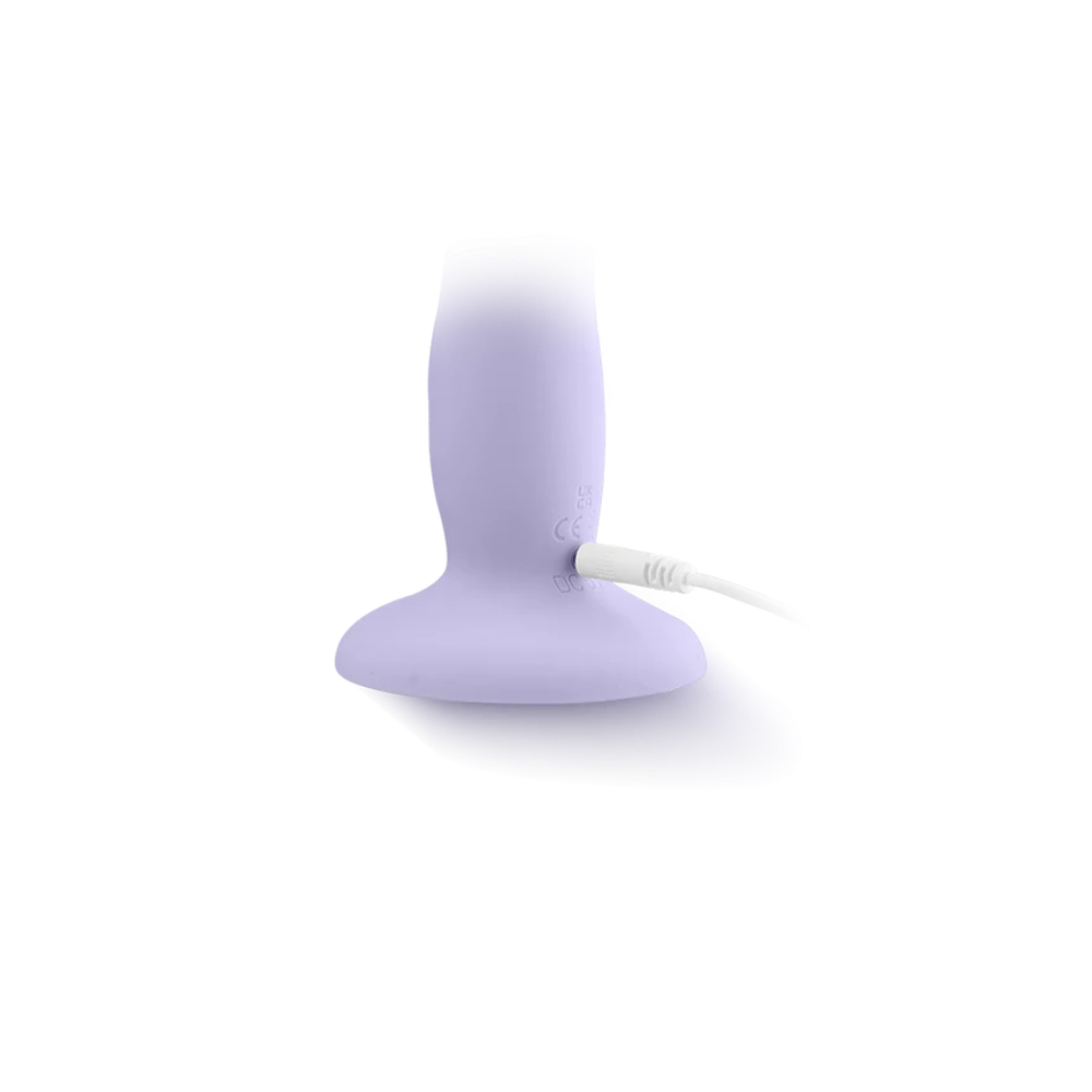 Purple flared base of Velvet Tease with a white cable on a white background