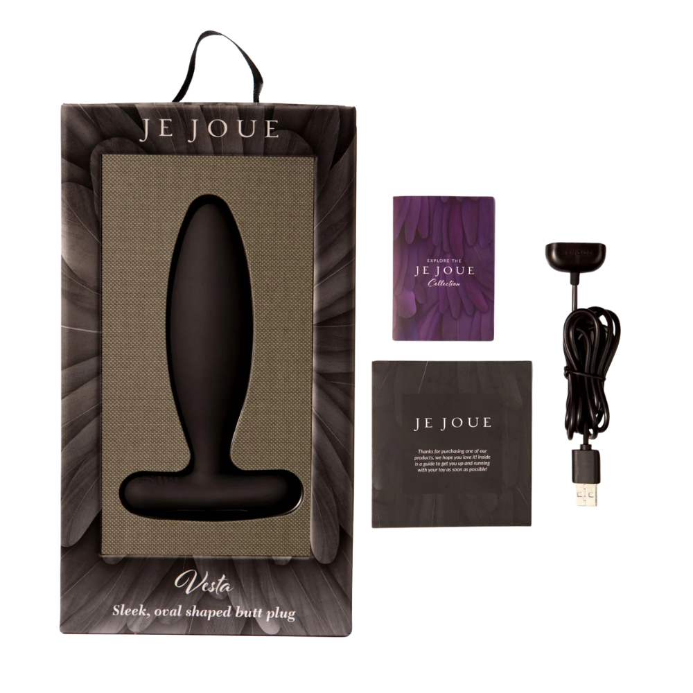 A black Vesta by Je Joue in the obx with the charger and contents.