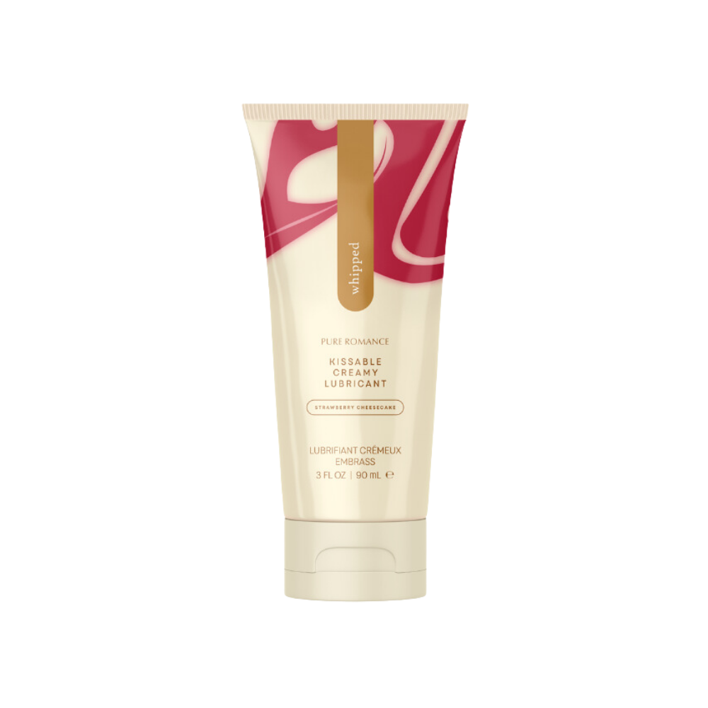 A cream colored tube of Strawberry Cheesecake Whipped Lubricant by Euforia.