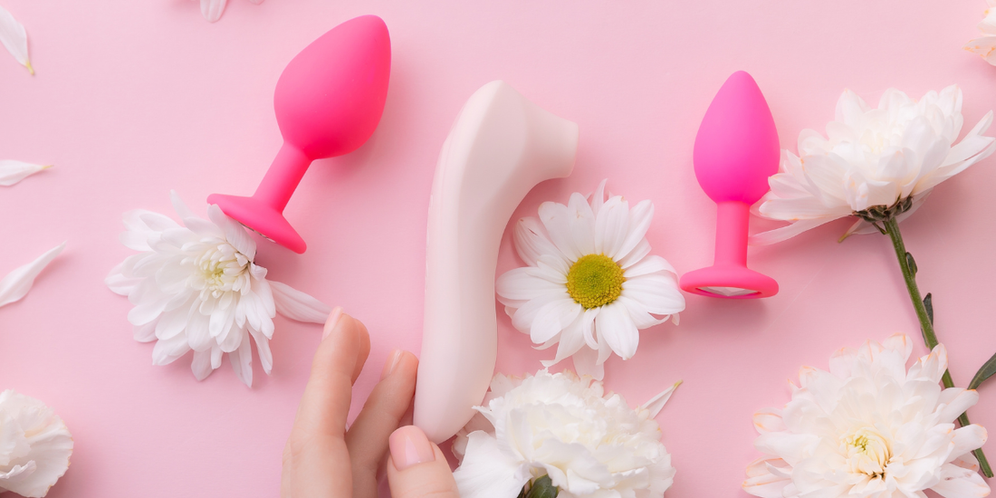pink toys on floral background