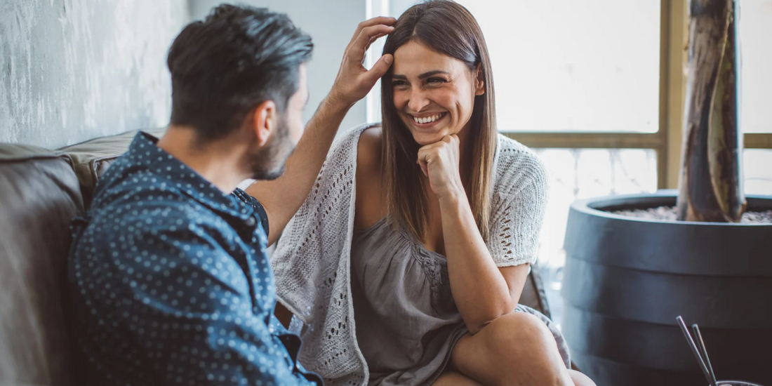couple smiling at one another