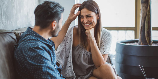 couple smiling at one another