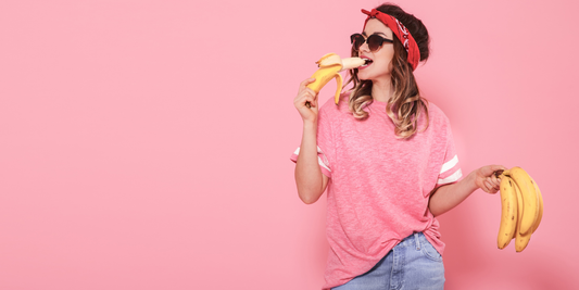 woman eating a banana
