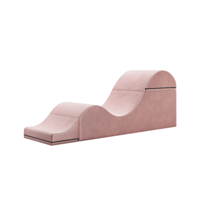 Rose aria chaise folded out into a chaise on a white background