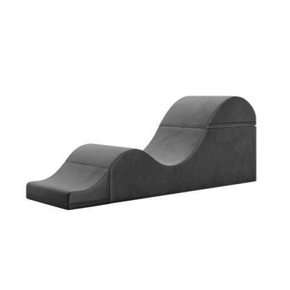 Black aria chaise folded out into a chaise on a white background