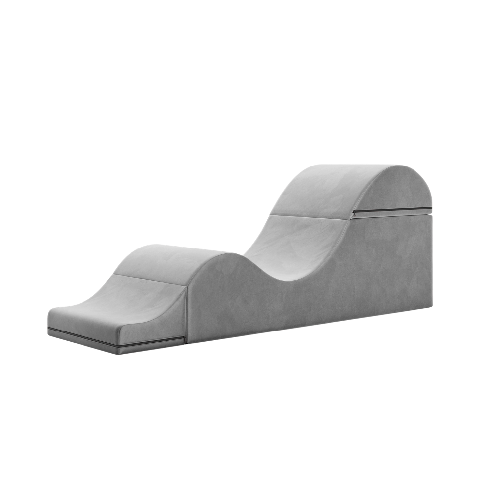 Grey aria chaise folded out into a chaise on a white background