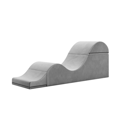Grey aria chaise folded out into a chaise on a white background