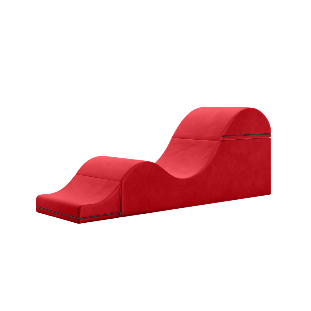red aria chaise folded out into a chaise on a white background
