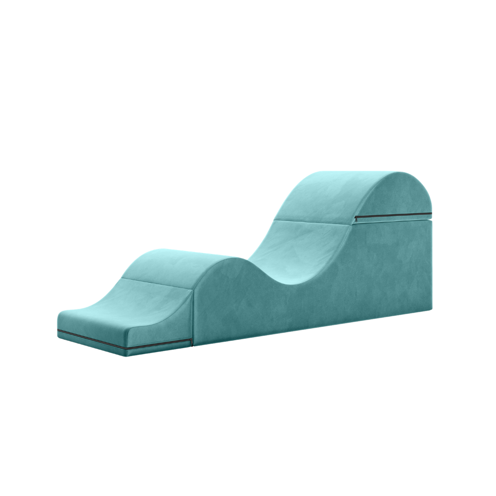 Teal aria chaise folded out into a chaise on a white background