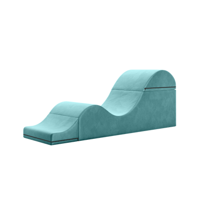 Teal aria chaise folded out into a chaise on a white background