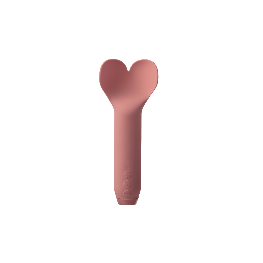 A rose colored Amour Bullet by Je Joue with the heart top.