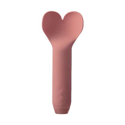 Pink heart-shaped Je Joue vibrator on a white background