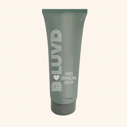 A green bottle of B Luvd Girth Enhancement Cream against a white background.