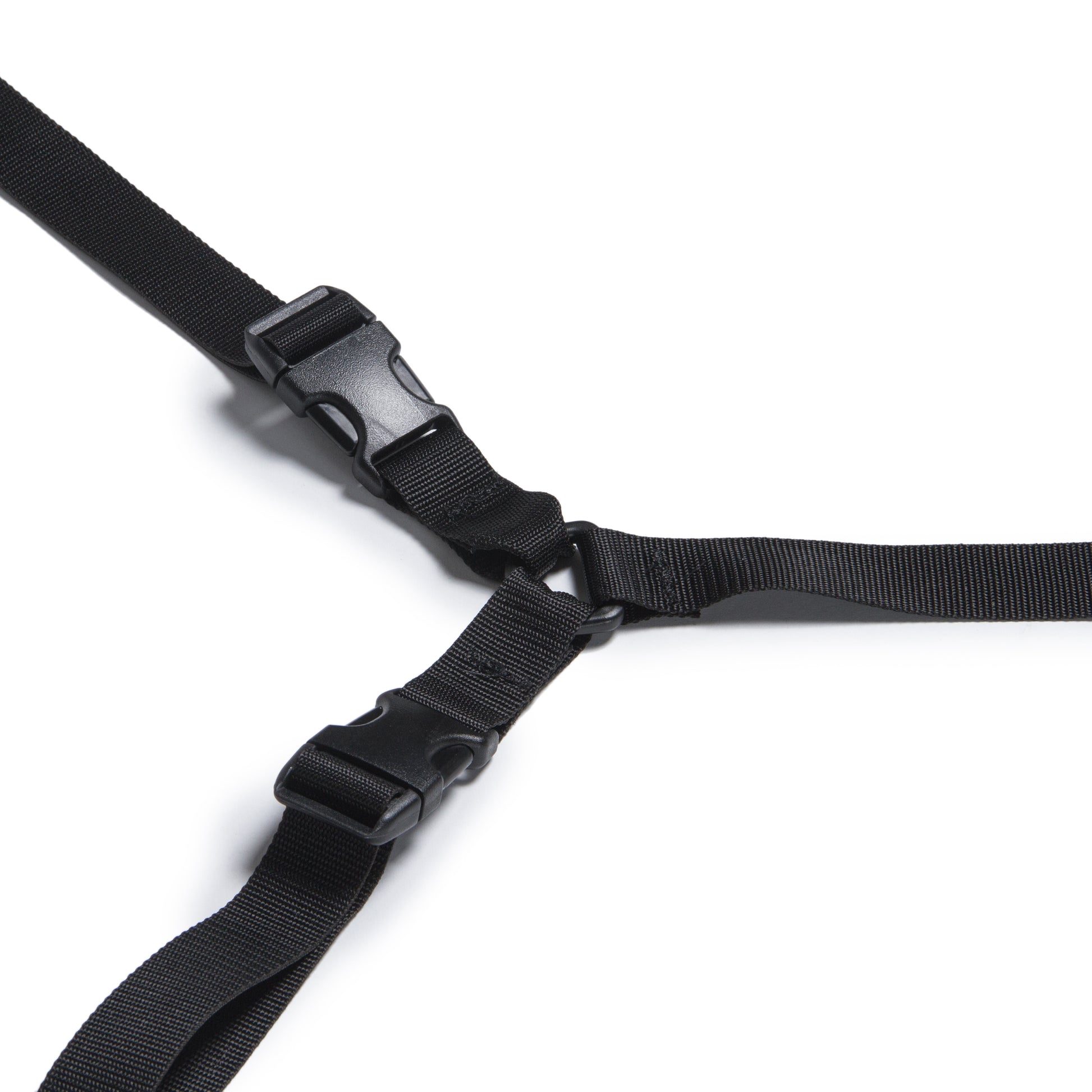 Black Bed Buckler, Bedroom Furniture by Liberator buckles on a white background.