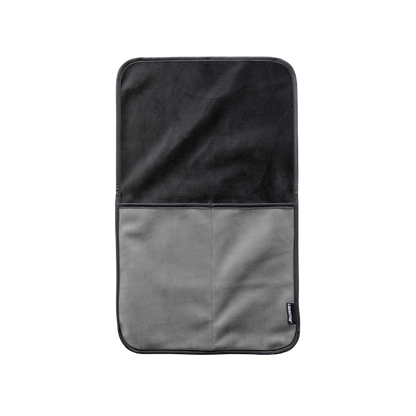 A grey bed caddy by Fascinator.