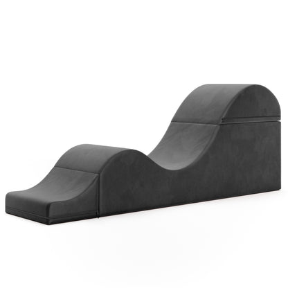 A black Aria Flip Chaise by Liberator unfolded into a chaise against a white background.