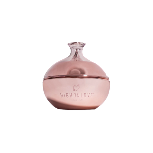 Pink bottle of Body Butter by High On Love.