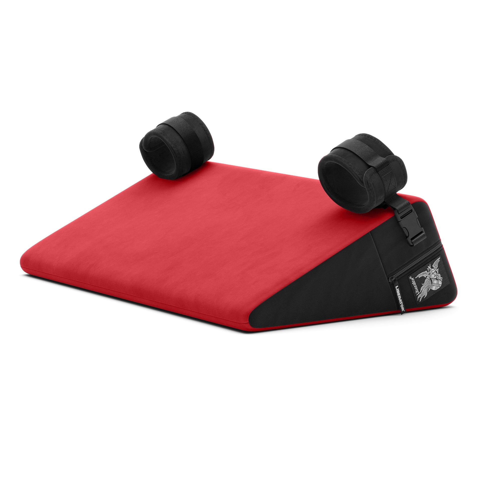 A red Bondage Wedge, Bedroom Furniture by Liberator with handcuffs on a white background.