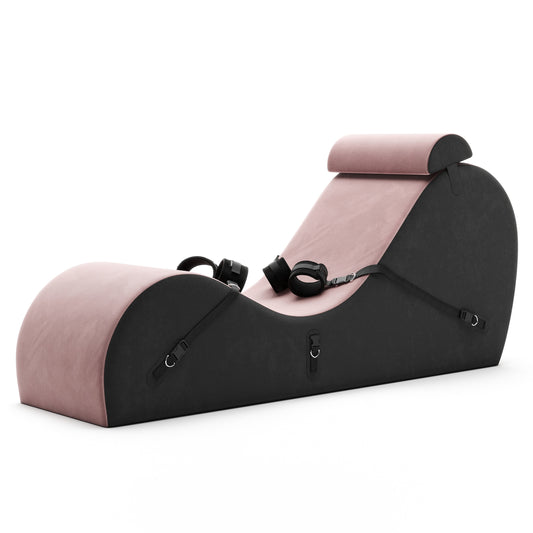 A rose colored valkyrie Cello Chaise against a white background.