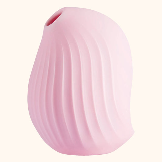 A pink Cuddly Bird Pro, air Bedroom Toy by Liberator against a white background.