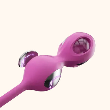 A close up view of a pink Elektra-App-controlled E-Stim Kegel Training set against a white background showing the stimulating plates.