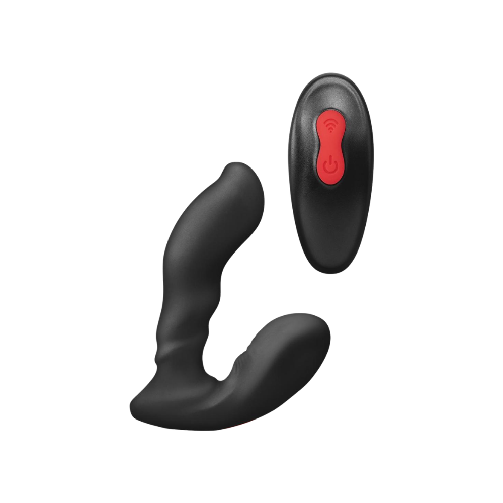 A black Sidetrack prostate vibe by Envy sitting next to the remote.