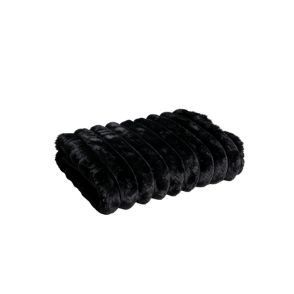A black Fascinator Luxe Splashproof Fur blanket folded.