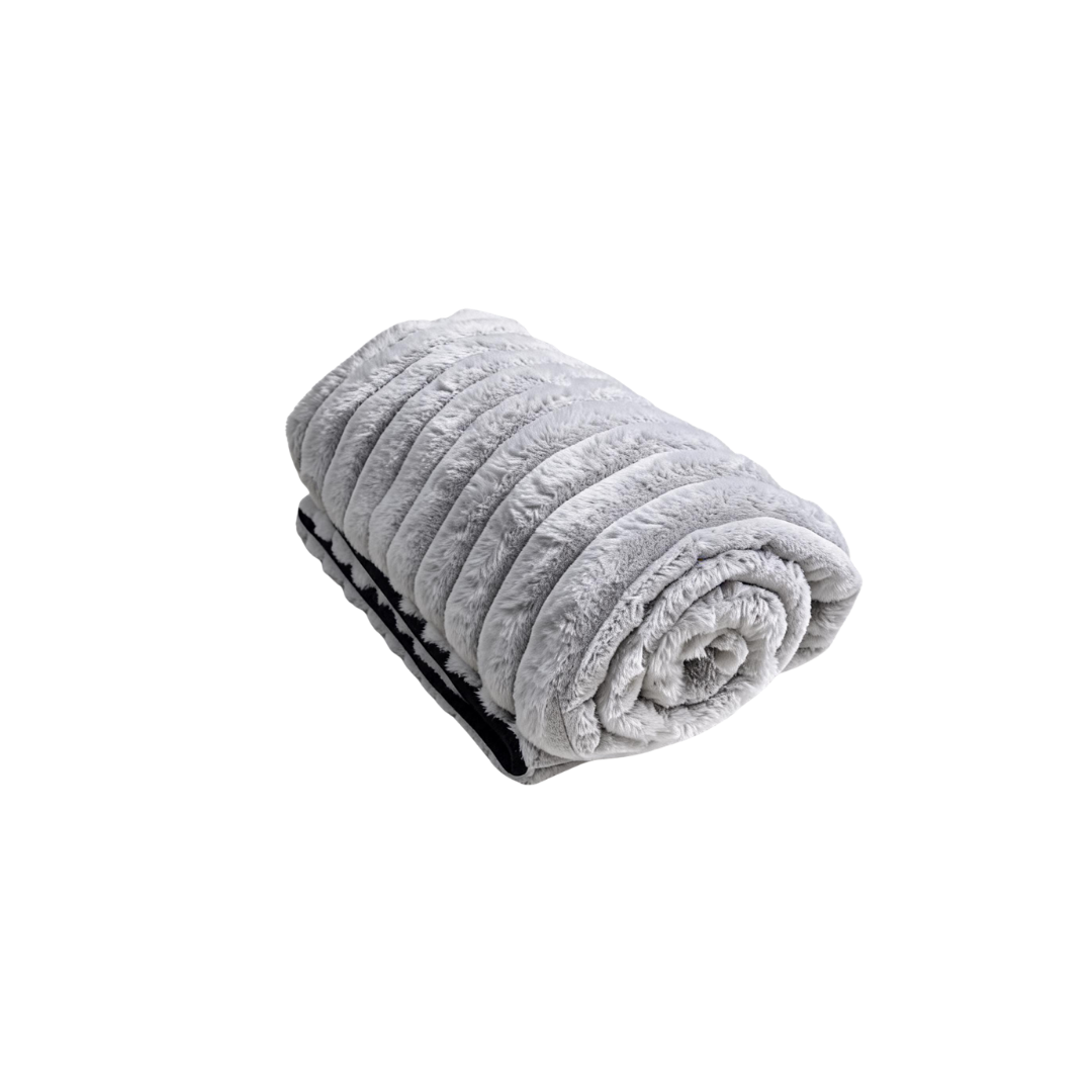A grey Fascinator Luxe Splashproof Fur blanket rolled up.