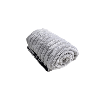 A grey Fascinator Luxe Splashproof Fur blanket rolled up.