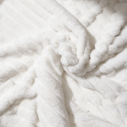 A white Fascinator Luxe Splashproof Fur blanket.