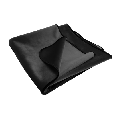A black Fascinator Splashproof Throws, Bedroom Furniture by Liberator folded up.