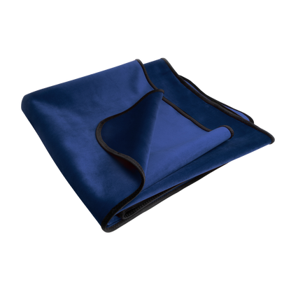 An indigo Fascinator Splashproof Throws, Bedroom Furniture by Liberator folded up.