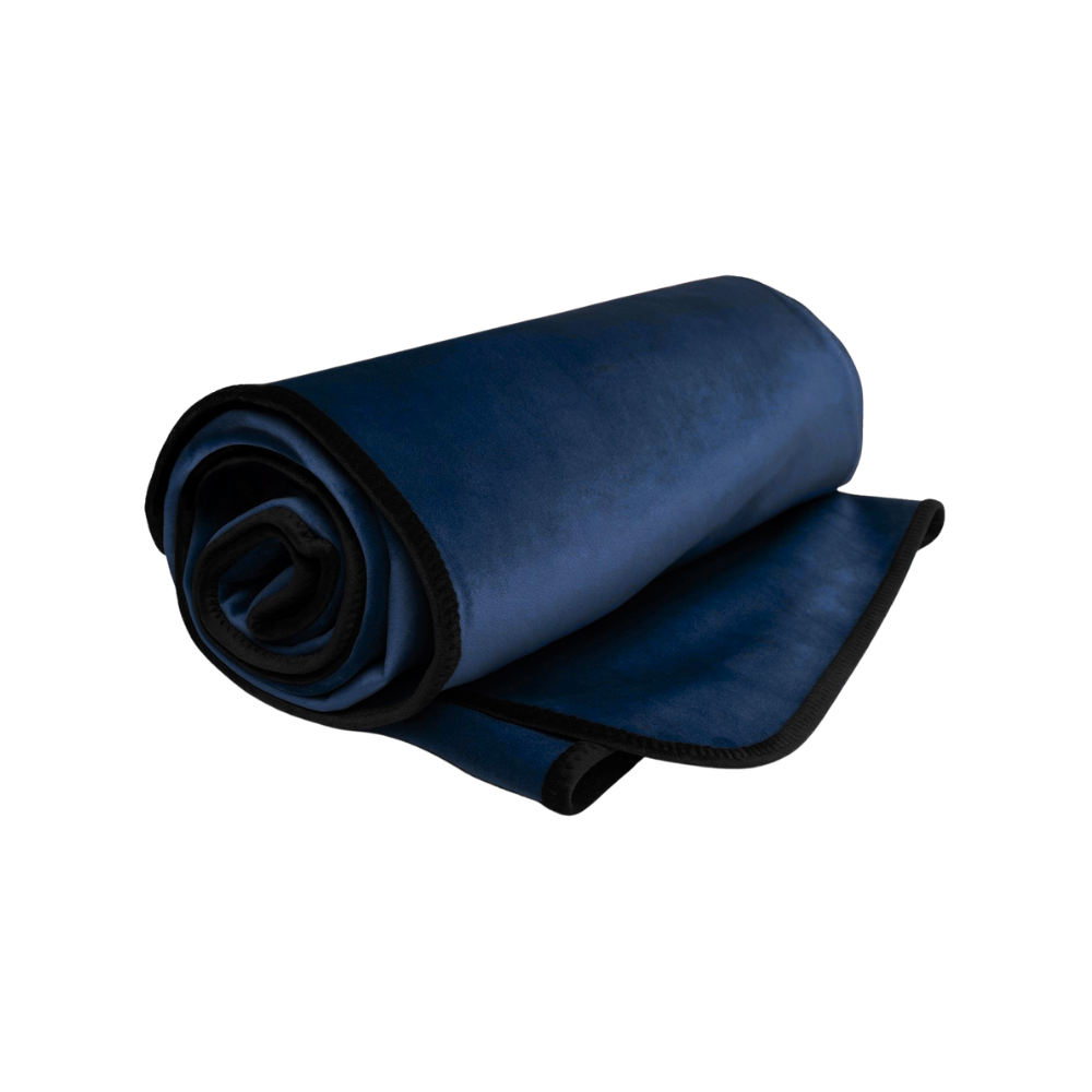 An indigo Fascinator Splashproof Throws, Bedroom Furniture by Liberator rolled up.