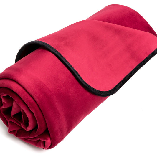 A merlot Fascinator Splashproof Throws, Bedroom Furniture by Liberator against a white background.