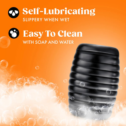 Black male sleeve on a orange background showing it is lubricated and easy to clean.