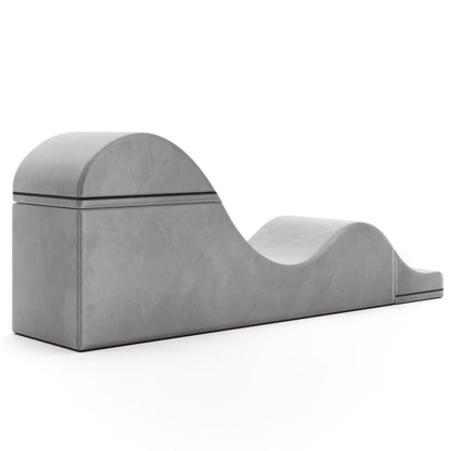 A grey Aria Flip Chaise by Liberator unfolded into a chaise against a white background.