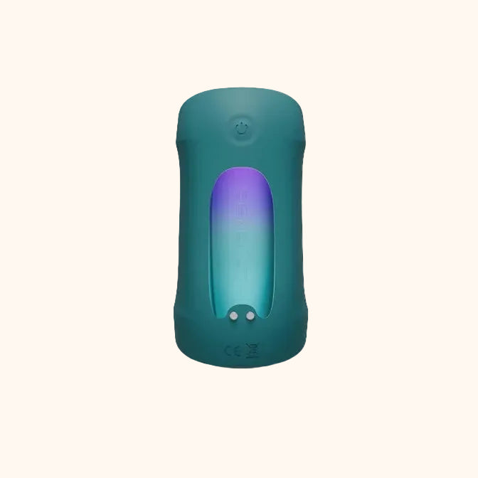 A green Gush 2 male masturbator against a white background showing the inside.