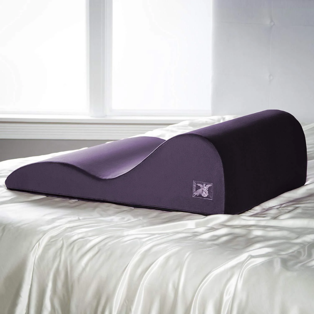 Purple hipster pillow white bed