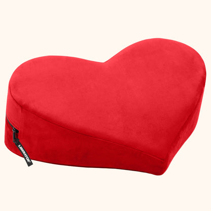 A red Heart Wedge, Bedroom Furniture by Liberator against a white background.