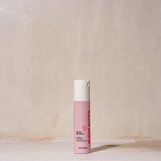 A pink bottle of ingrown hair serum by Beaver Butter against a white background.