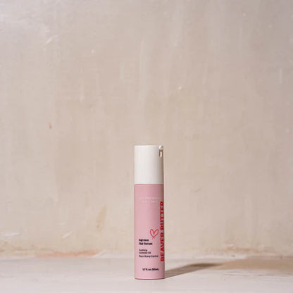 A pink bottle of ingrown hair serum by Beaver Butter against a white background.