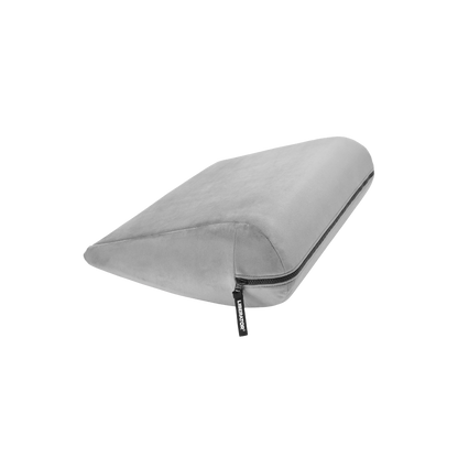 Grey double curved Jaz pillow with a black zipper on a white background