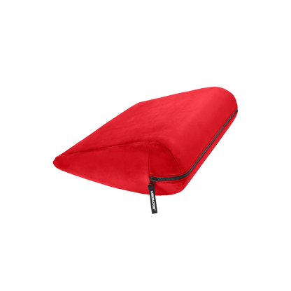 Red double curved Jaz pillow with a black zipper on a white background