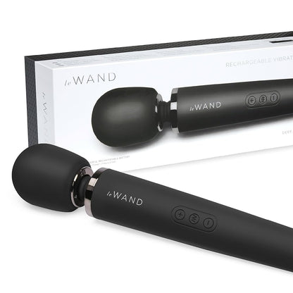 Black 'Le Wand' electronic device with packaging on a white background