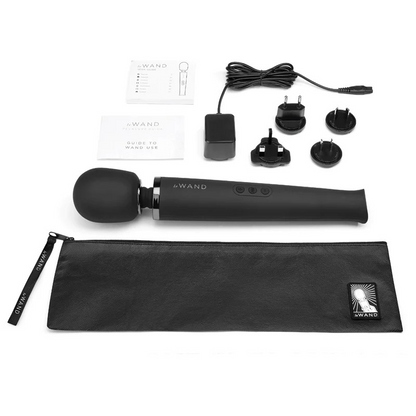 Black Le Wand device with accessories on a white background
