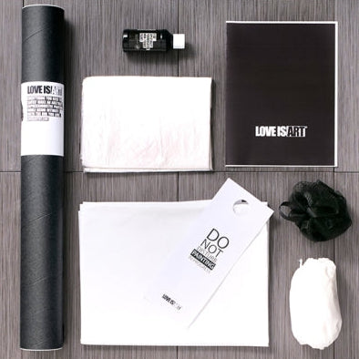 Bold Black Love is Art Kit contents including canvas, paint, protective sheet, and accessories for intimate body painting.